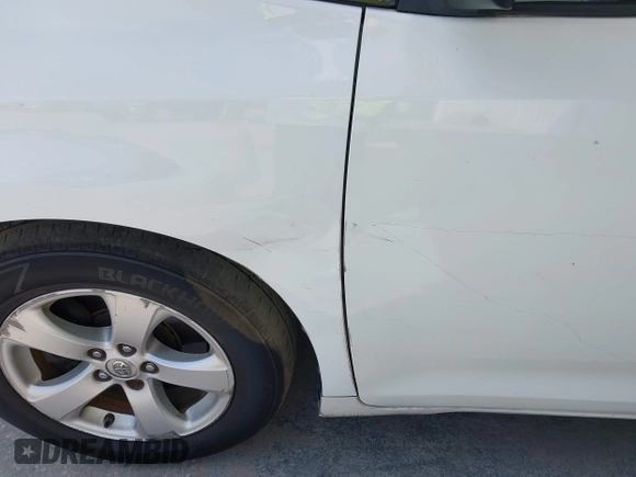 2014 Toyota Sienna LE AAS with VIN 5TDKK3DC2ES513425, listed as a IAAI auction lot 42107820 with 367,844 mi miles and . Bid and sale history available at carsss.com. Image 6.