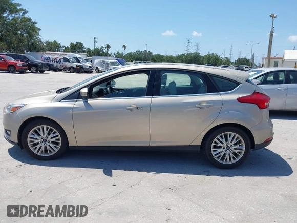 2017 Ford Focus Titanium с VIN 1FADP3N21HL327581, выставлен на аукционе IAAI как лот 42342179 с пробегом 61 489 миль миль и . История ставок и продаж доступна на DreamBid. Изображение 14.