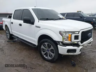 2019 Ford F-150 XL with VIN 1FTEW1C52KKD70455, listed as a IAAI auction lot 41457239 with 97,295 mi miles and . Bid and sale history available at carsss.com. Image 1.