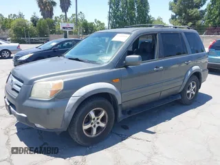 2007 Honda Pilot EX-L with VIN 5FNYF18587B015655, listed as a IAAI auction lot 42485193 with 293,684 mi miles and . Bid and sale history available at DreamBid. Image 2.