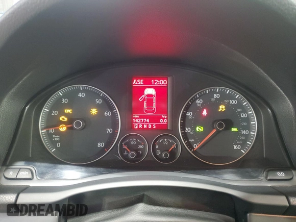 2009 Volkswagen Eos Komfort with VIN WVWBA71F69V019864, listed as a Copart auction lot 52378095 with 142,774 mi miles and Salvage Title. Bid and sale history available at DreamBid. Image 9.