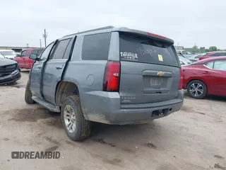 2020 Chevrolet Tahoe LS z VIN 1GNSCAKC3LR101733, wystawiony jako IAAI lot #41912918 z przebiegiem 153 731 mil mil oraz . Historia ofert i sprzedaży dostępna na DreamBid. Obrazek 3.