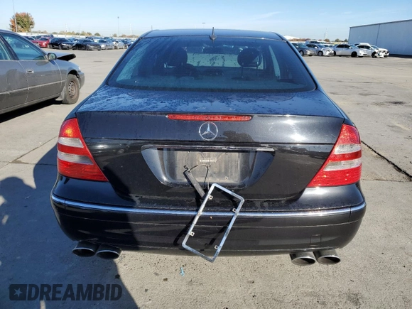 2004 Mercedes-Benz E-Class 5.0L with VIN WDBUF70J64A585084, listed as a Copart auction lot 80297124 with 233,638 mi miles and Salvage Title. Bid and sale history available at carsss.com. Image 6.