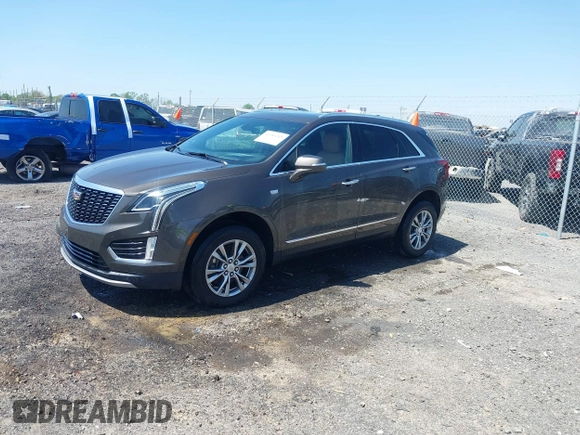 2020 Cadillac XT5 Premium Luxury FWD with VIN 1GYKNCRS0LZ220006, listed as a IAAI auction lot 41985265 with 47,464 mi miles and . Bid and sale history available at carsss.com. Image 2.