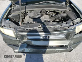 2006 Honda Ridgeline RTS z VIN 2HJYK16496H511588, wystawiony jako Copart lot #58240785 z przebiegiem 197 639 mil mil oraz Szkoda całkowita • Salvage title. Historia ofert i sprzedaży dostępna na DreamBid. Obrazek 11.