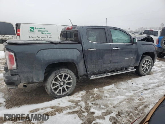 2021 GMC Canyon 4WD Denali with VIN 1GTG6EENXM1199427, listed as a Copart auction lot 86018624 with 98,520 mi miles and Salvage Title. Bid and sale history available at carsss.com. Image 3.