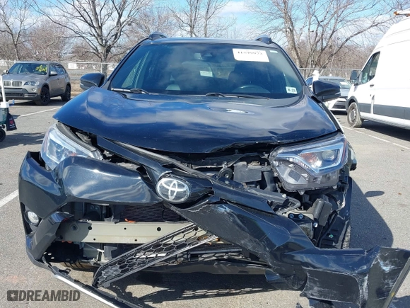 2018 Toyota RAV4 SE with VIN 2T3JFREVXJW817341, listed as a IAAI auction lot 41599972 with 99,739 mi miles. Bid and sale history available at carsss.com. Image 6.