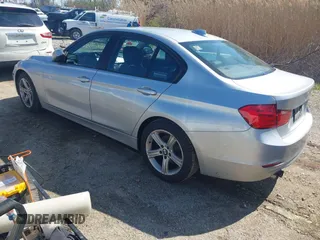 2013 BMW 3 Series 328i with VIN WBA3C1G52DNR44660, listed as a IAAI auction lot 41994277 with 165,151 mi miles and . Bid and sale history available at carsss.com. Image 3.
