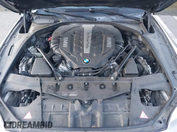 2013 BMW 6 Series 650i with VIN WBAYM9C57DDW20312, listed as a IAAI auction lot 41861212 with 98,662 mi miles and . Bid and sale history available at carsss.com. Image 10.