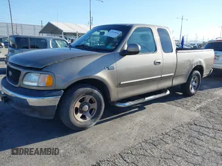 2002 Ford F-150 XL with VIN 1FTRX17232NA79508, listed as a IAAI auction lot 41870844 with 111,429 mi miles. Bid and sale history available at carsss.com. Image 2.