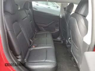 2022 Tesla Model Y Long Range z VIN 7SAYGDEE5NF387781, wystawiony jako Copart lot #50248215 z przebiegiem 24 173 mil mil oraz Szkoda całkowita • Salvage title. Historia ofert i sprzedaży dostępna na DreamBid. Obrazek 10.
