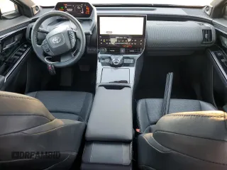 2023 Toyota bZ4X XLE with VIN JTMAAAAAXPA019772, listed as a Copart auction lot 85053124 with 9,591 mi miles and Salvage Title. Bid and sale history available at DreamBid. Image 8.