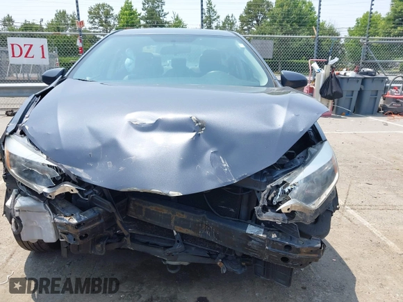 2014 Toyota Corolla L with VIN 2T1BURHEXEC150874, listed as a IAAI auction lot 42381275 with 183,022 mi miles and . Bid and sale history available at DreamBid. Image 12.