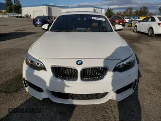 2015 BMW 2 Series 228i with VIN WBA1F9C54FVW98698, listed as a Copart auction lot 47660115 with 91,221 mi miles and Salvage Title. Bid and sale history available at carsss.com. Image 5.