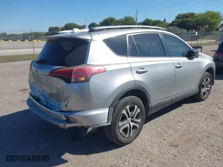 2018 Toyota RAV4 LE with VIN JTMZFREVXJJ196183, listed as a IAAI auction lot 41776107 with 82,713 mi miles. Bid and sale history available at carsss.com. Image 4.