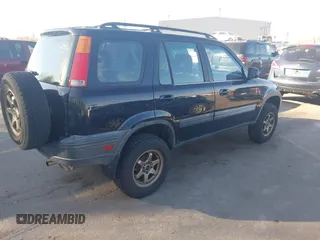 2000 Honda CR-V EX with VIN JHLRD1866YC025833, listed as a IAAI auction lot 42039440 with 238,599 mi miles. Bid and sale history available at carsss.com. Image 4.