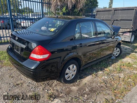 2010 Nissan Versa 1.6 with VIN 3N1CC1AP5AL391286, listed as a IAAI auction lot 42005172 with 33,441 mi miles. Bid and sale history available at carsss.com. Image 4.