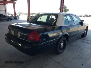 2010 Ford Police Interceptor with VIN 2FABP7BV1AX134885, listed as a IAAI auction lot 42630907 with Not provided miles and . Bid and sale history available at DreamBid. Image 4.