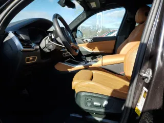 2023 BMW X5 sDrive40i with VIN 5UXCR4C0XP9P08573, listed as a Copart auction lot 85560524 with 67,939 mi miles and Salvage title. Bid and sale history available at DreamBid. Image 7.