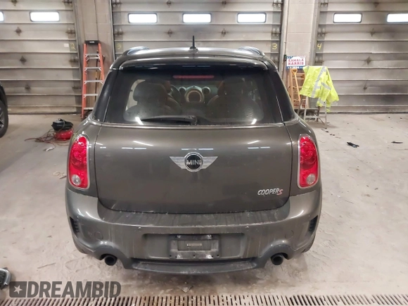 2012 MINI Countryman S with VIN WMWZC3C59CWL83491, listed as a IAAI auction lot 41791573 with 115,355 mi miles and . Bid and sale history available at DreamBid. Image 17.