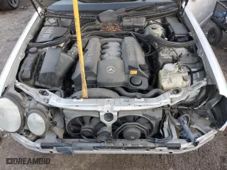 2000 Mercedes-Benz E-Class with VIN WDBJF70J7YB049473, listed as a Copart auction lot 82396624 with 197,515 mi miles and Salvage Title. Bid and sale history available at carsss.com. Image 11.