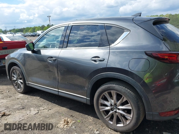 2019 Mazda CX-5 Grand Touring with VIN JM3KFBDM7K0619379, listed as a IAAI auction lot 42007107 with 209,590 mi miles. Bid and sale history available at carsss.com. Image 14.