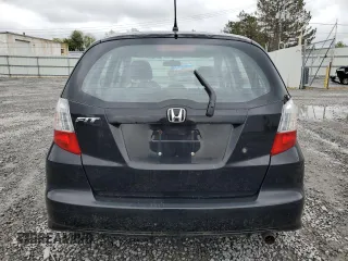 2010 Honda Fit z VIN JHMGE8H22AS027239, wystawiony jako Copart lot #59358935 z przebiegiem 121 802 mil mil oraz Czysty tytuł • Clean title. Historia ofert i sprzedaży dostępna na DreamBid. Obrazek 6.