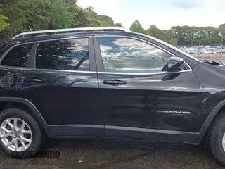 2015 Jeep Cherokee Latitude z VIN 1C4PJMCB4FW648897, wystawiony jako IAAI lot #42182493 z przebiegiem 129 457 mil mil oraz . Historia ofert i sprzedaży dostępna na DreamBid. Obrazek 13.