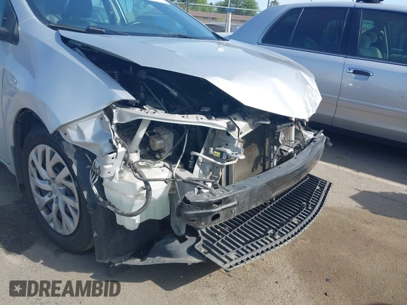 2019 Toyota Corolla L with VIN 2T1BURHE2KC190975, listed as a IAAI auction lot 41901370 with 94,925 mi miles. Bid and sale history available at carsss.com. Image 18.