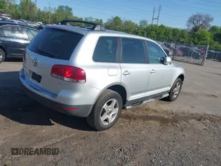 2005 Volkswagen Touareg 3.2L V6 with VIN WVGZG77L75D076211, listed as a IAAI auction lot 42143669 with 158,586 mi miles and . Bid and sale history available at DreamBid. Image 4.