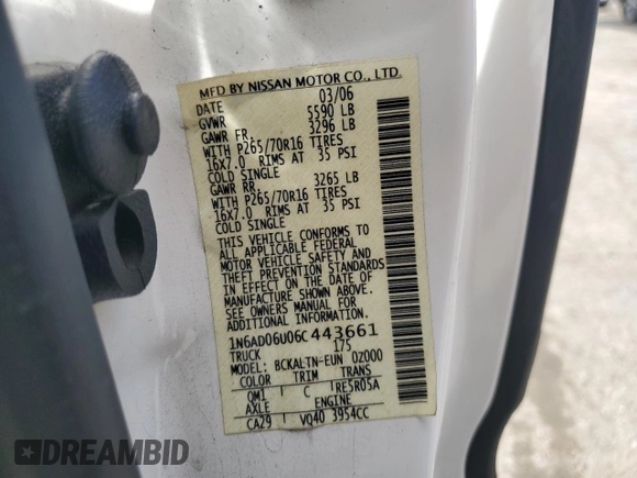 2006 Nissan Frontier SE with VIN 1N6AD06U06C443661, listed as a Copart auction lot 52764075 with 100,737 mi miles and Salvage title. Bid and sale history available at DreamBid. Image 14.