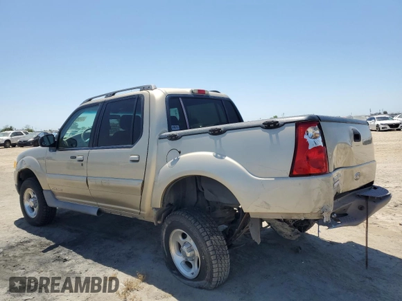 2001 Ford Explorer Sport Trac with VIN 1FMZU67E61UC71358, listed as a Copart auction lot 57982355 with 108,601 mi miles and Salvage title. Bid and sale history available at DreamBid. Image 2.