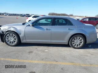 2014 Chrysler 300 C with VIN 2C3CCAKG3EH212936, listed as a IAAI auction lot 40921649 with 153,000 mi miles and . Bid and sale history available at carsss.com. Image 14.
