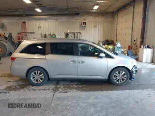 2015 Honda Odyssey EX-L with VIN 5FNRL5H6XFB063430, listed as a IAAI auction lot 41913142 with 238,051 mi miles and . Bid and sale history available at carsss.com. Image 13.