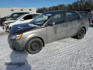 2011 Kia Rio with VIN KNADH4B32B6915325, listed as a Copart auction lot 86824074 with 167,410 mi miles and Salvage Title. Bid and sale history available at DreamBid. Image 1.