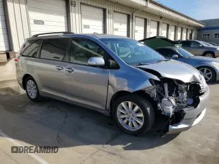 2013 Toyota Sienna XLE AAS with VIN 5TDYK3DC1DS318277, listed as a Copart auction lot 54156935 with 218,564 mi miles and Salvage title. Bid and sale history available at DreamBid. Image 4.