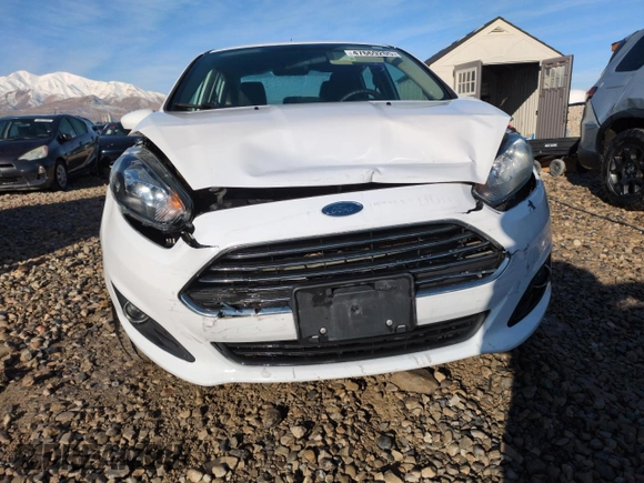2019 Ford Fiesta SE with VIN 3FADP4BJ9KM124350, listed as a Copart auction lot 47669205 with 96,141 mi miles and Salvage Title. Bid and sale history available at carsss.com. Image 5.