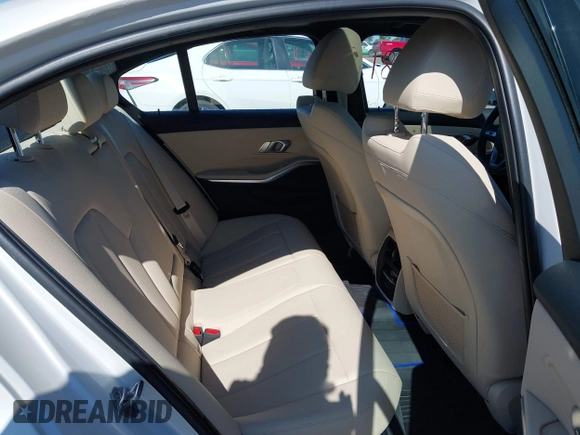 2021 BMW 3 Series 330i xDrive with VIN WBA5R7C0XMFK54525, listed as a IAAI auction lot 42320181 with 54,576 mi miles and . Bid and sale history available at DreamBid. Image 8.