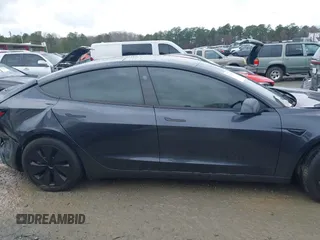 2024 Tesla Model 3 z VIN 5YJ3E1EAXRF860931, wystawiony jako IAAI lot #41760589 z przebiegiem 12 273 mil mil oraz . Historia ofert i sprzedaży dostępna na DreamBid. Obrazek 13.