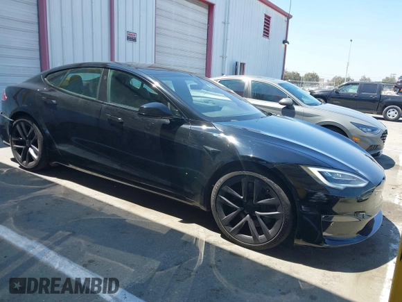 2021 Tesla Model S Long Range z VIN 5YJSA1E54MF429360, wystawiony jako IAAI lot #42662440 z przebiegiem 36 395 mil mil oraz . Historia ofert i sprzedaży dostępna na DreamBid. Obrazek 1.