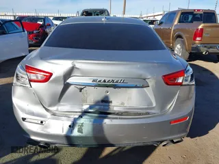 2015 Maserati Ghibli z VIN ZAM57XSA7F1135961, wystawiony jako IAAI lot #40831583 z przebiegiem 89 671 mil mil oraz . Historia ofert i sprzedaży dostępna na DreamBid. Obrazek 16.