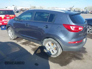 2012 Kia Sportage LX with VIN KNDPBCA28C7273676, listed as a IAAI auction lot 42034764 with 121,527 mi miles and . Bid and sale history available at DreamBid. Image 3.