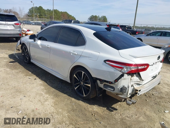 2020 Toyota Camry XSE with VIN 4T1K61AK8LU987937, listed as a IAAI auction lot 41604530 with 102,967 mi miles and . Bid and sale history available at DreamBid. Image 3.