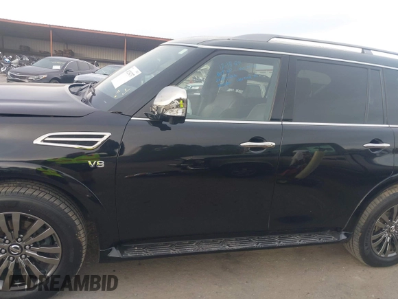 2019 Nissan Armada Platinum z VIN JN8AY2NF0K9351290, wystawiony jako IAAI lot #41234737 z przebiegiem 118 737 mil mil oraz . Historia ofert i sprzedaży dostępna na DreamBid. Obrazek 14.