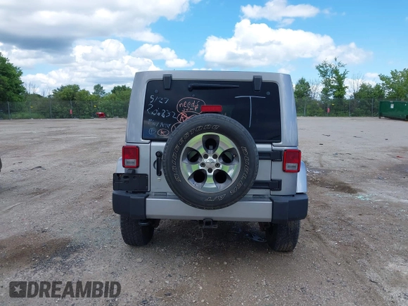 2018 Jeep Wrangler Unlimited Sahara with VIN 1C4BJWEGXJL806832, listed as a IAAI auction lot 42605892 with 90,535 mi miles and . Bid and sale history available at DreamBid. Image 16.