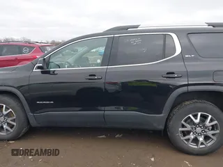 2023 GMC Acadia SLT with VIN 1GKKNML45PZ185835, listed as a IAAI auction lot 41843865 with 43,546 mi miles and . Bid and sale history available at carsss.com. Image 14.