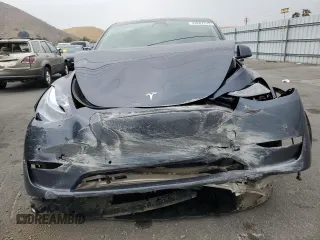 2022 Tesla Model Y Performance z VIN 7SAYGDEF1NF457494, wystawiony jako Copart lot #43287315 z przebiegiem 79 855 mil mil oraz Szkoda całkowita • Salvage title. Historia ofert i sprzedaży dostępna na DreamBid. Obrazek 5.