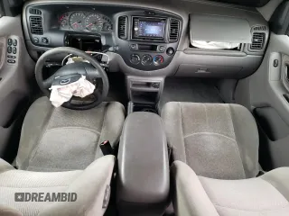 2002 Mazda Tribute LX with VIN 4F2CU08122KM01491, listed as a Copart auction lot 45290265 with 134,141 mi miles and Salvage Title. Bid and sale history available at carsss.com. Image 8.