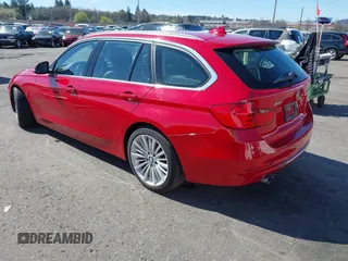 2014 BMW 3 Series 328i xDrive with VIN WBA3G7C58EKN36972, listed as a IAAI auction lot 41854952 with 112,201 mi miles and . Bid and sale history available at carsss.com. Image 3.