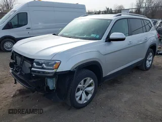 2018 Volkswagen Atlas SE with VIN 1V2KR2CA6JC560411, listed as a IAAI auction lot 41887472 with 168,155 mi miles and . Bid and sale history available at DreamBid. Image 20.